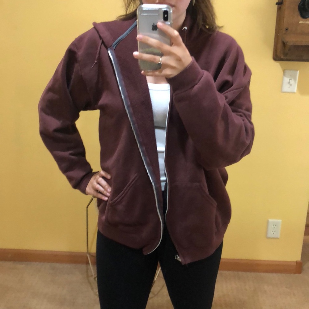 Gender neutral burgundy zip up sweater